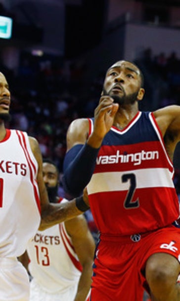 Wall flirts with triple-double, Wizards beat Rockets 123-122
